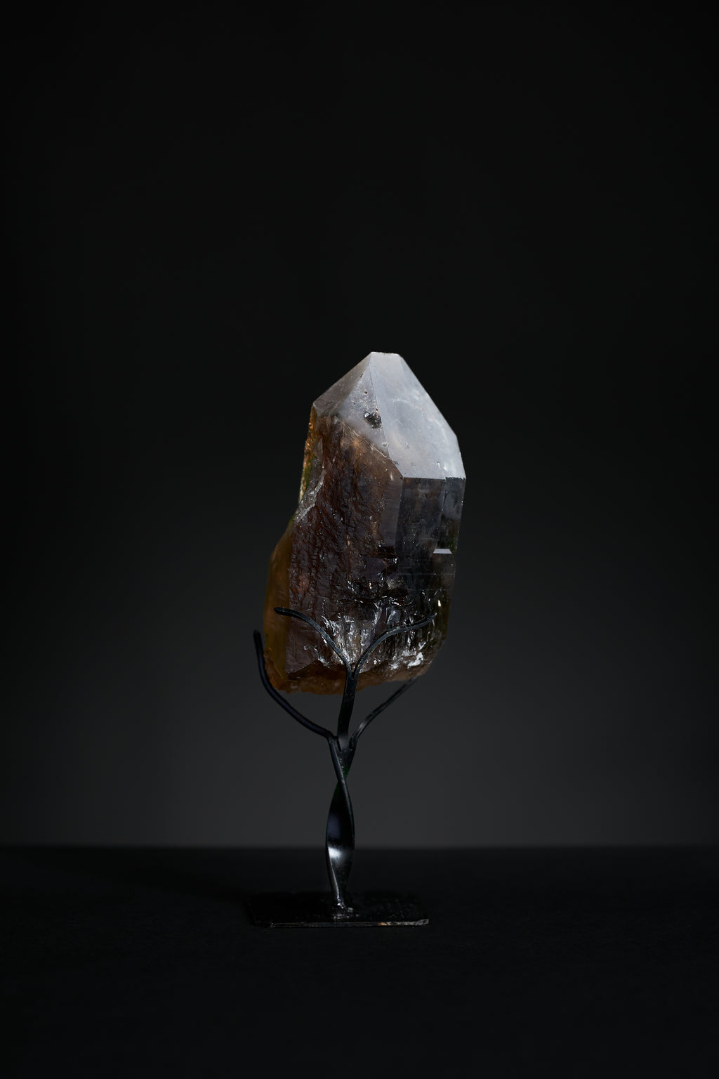 Overhead view of small smoky quartz point from Brazil