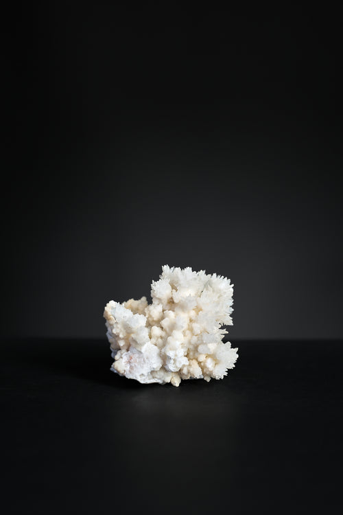 Aragonite crystal specimen from Mexico with warm natural tones, front view