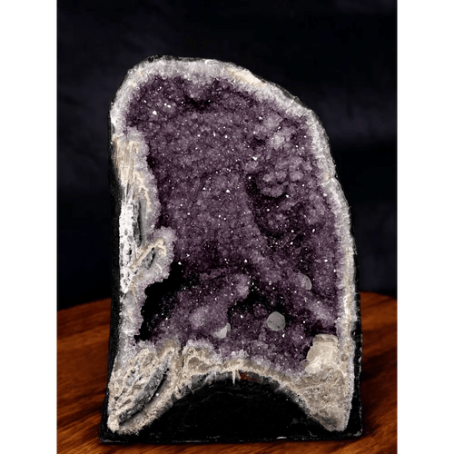 Amethyst druse with sparkling calcite crystals from Brazil, full front view