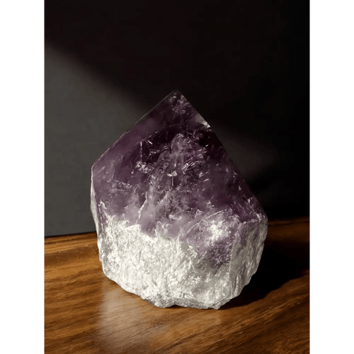 Large natural amethyst point with quartz base from Uruguay, full front view showing scale