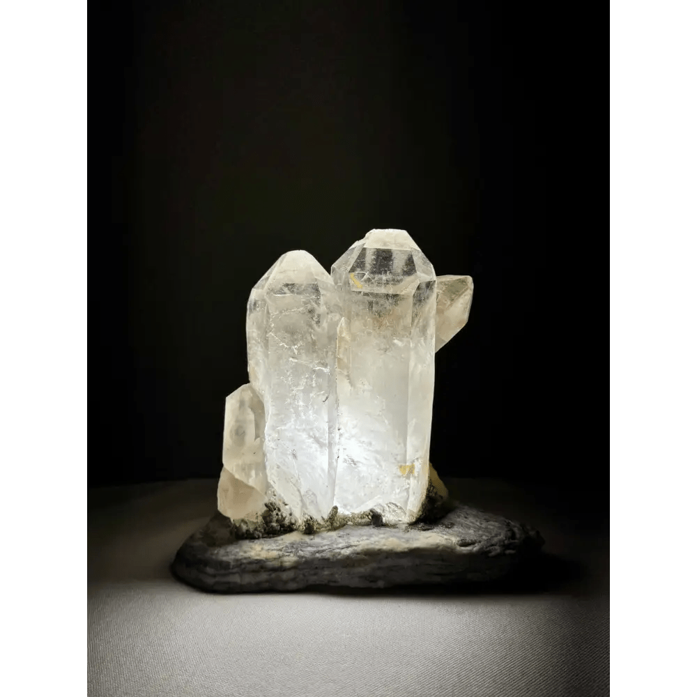 Rock crystal lamp with double crystal point from Brazil, illuminated front view