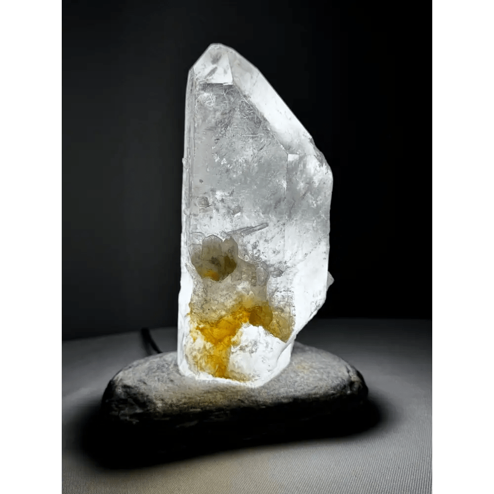 Detail of rock crystal surface showing yellow tones and natural light diffusion